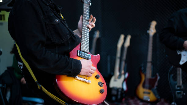 istock Unrecognizable electric guitarist man 1455304431