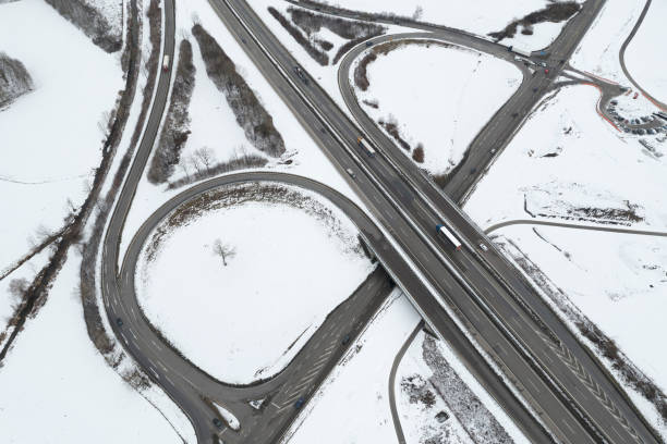 istock Aerial View of Highway Interchange in Winter 1455305218