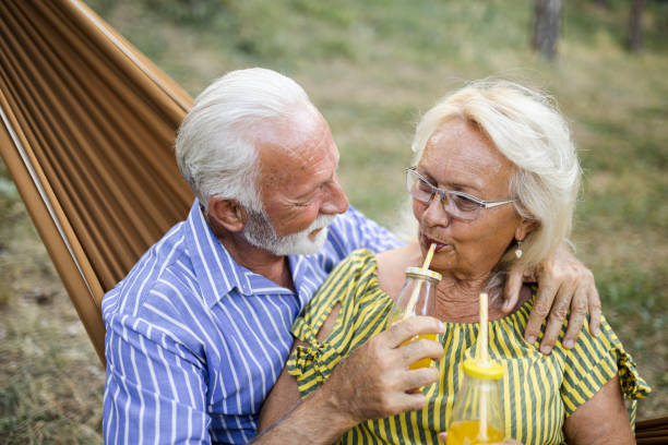 istock Senior couple relaxing and camping in nature 1455310629