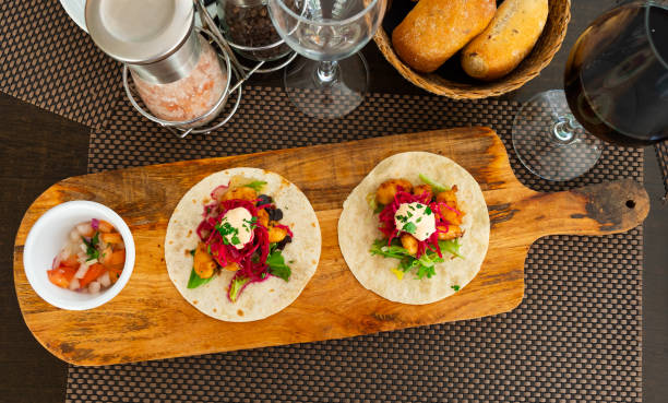 Shrimp tacos with Chipotle mayonnaise on table