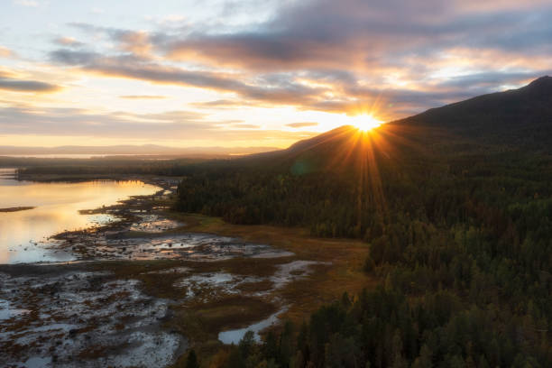 istock sunrise in mountains over the sea 1455314154