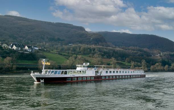 istock Cruise ship on the Rhine River valley in Germany 1455317125