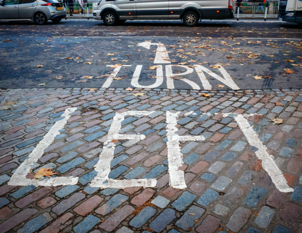 istock 'Turn left' - road markings in Westminster 1455320051