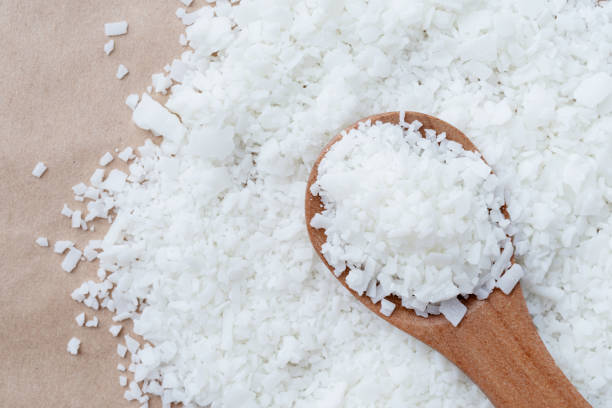 istock Close up of white soy wax for candle making. 1455323480