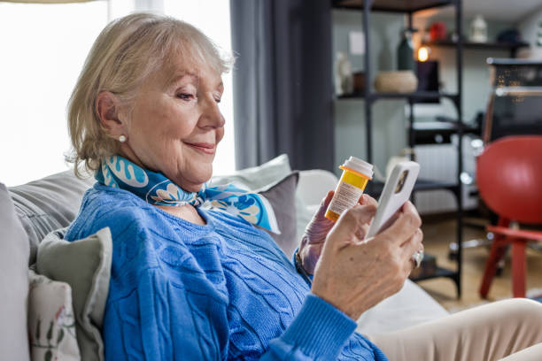 istock Senior woman using mobile health app 1455324784