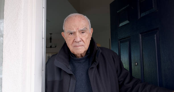 istock Pensive, Serious Old hispanic man looking at the camera 1455338802