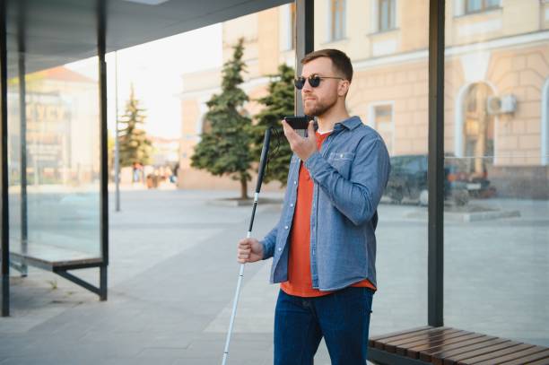 istock Blinded man waiting for bus at a bus station 1455340400