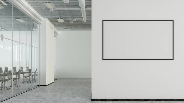 Blank horizontal poster mock up on the wall of modern office interior.