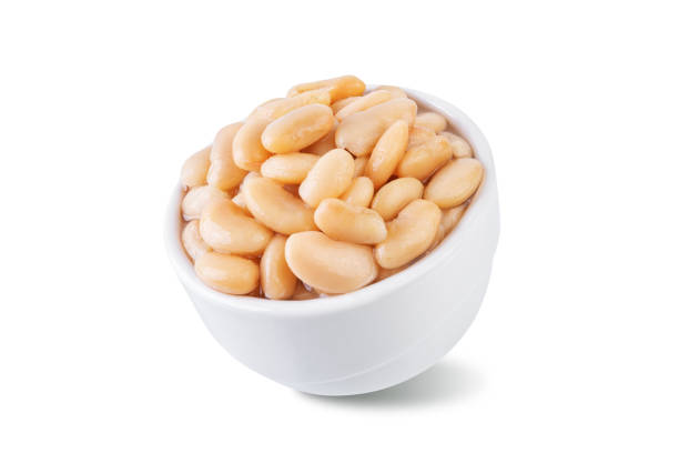 istock Fresh canned white beans in a bowl on a white isolated background 1455341643