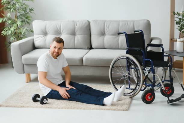 istock Disabled man recovering from injury at home 1455342435