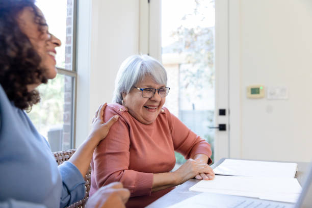 istock Mature woman enjoying conversation 1455343113