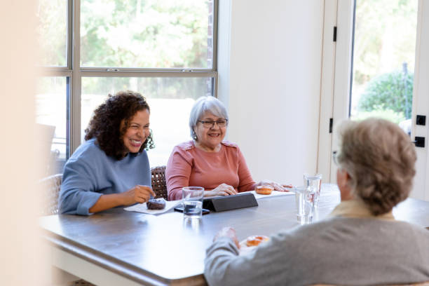istock Family enjoying breakfast at the dining room table 1455343117