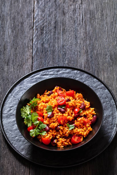 istock jollof rice with red beans, tomato, spices 1455347627