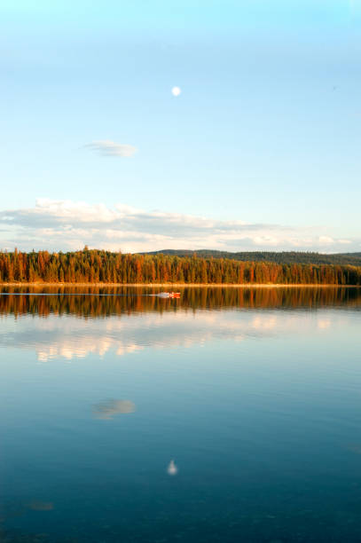 istock Boating on a lake at dusk 1455349286