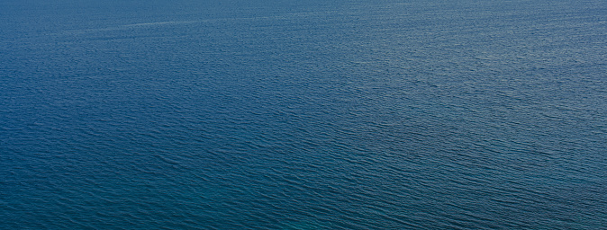 Top view of blue turquoise sea of magnificent Aegean sea. Watersurface view of Aegean sea.