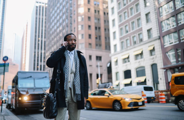 istock businessman on the phone in Lower Manhattan 1455356460
