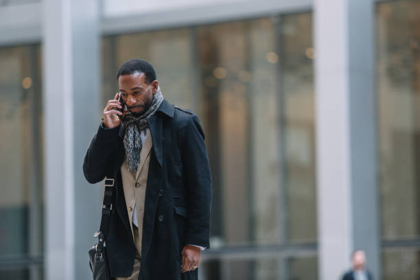 istock businessman on the phone in Lower Manhattan 1455356685