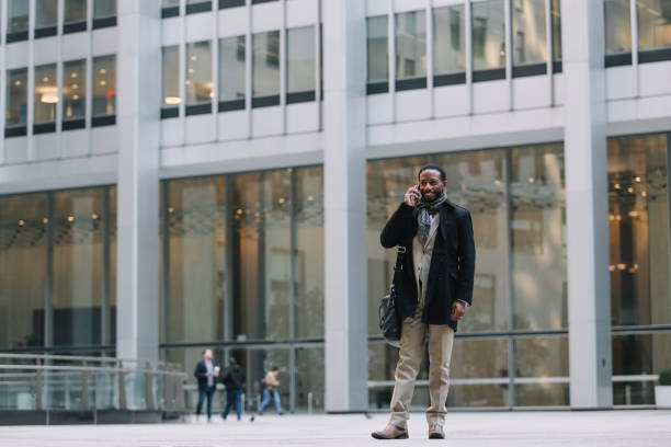 istock businessman on the phone in Lower Manhattan 1455356726