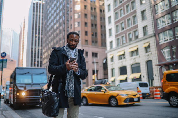 istock businessman on the phone in Lower Manhattan 1455356813