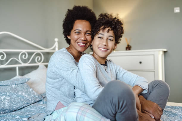 istock Happy mother and son looking at camera 1455357044