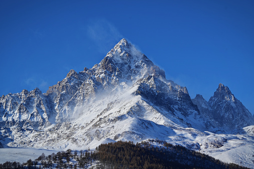Monviso, 3,842 meters, is the king of the Alps, imposing and majestic in its snowy beauty. A breathtaking view from the village of Ostana in Piedmont, Italy