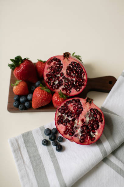 istock Healthy Blueberries, Strawberries, Pomegranate on Charcuterie Board 1455364012