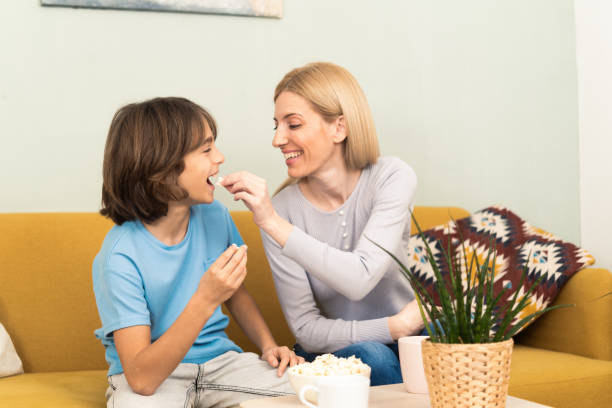 istock Young mom and small son relax at home 1455365051