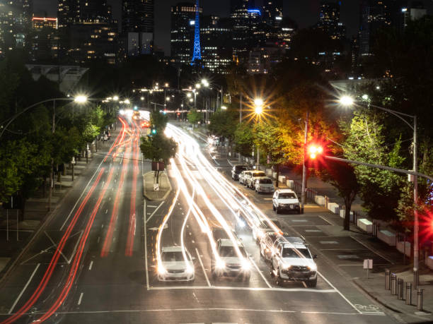 istock Light trails on city roads 1455365476