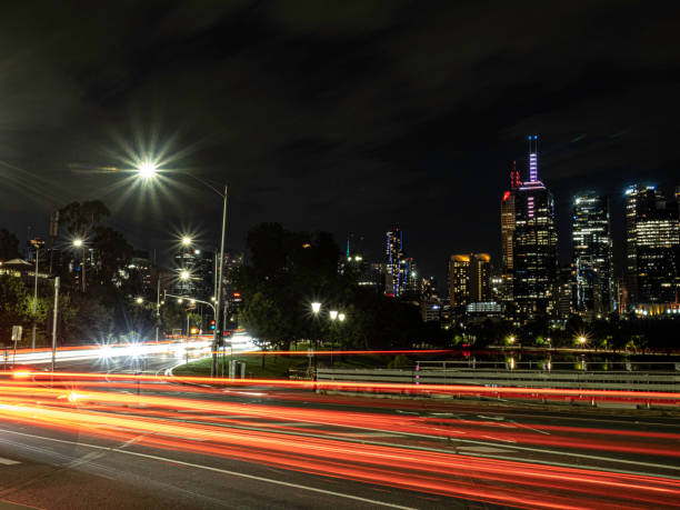 istock Light trails on city roads 1455365482