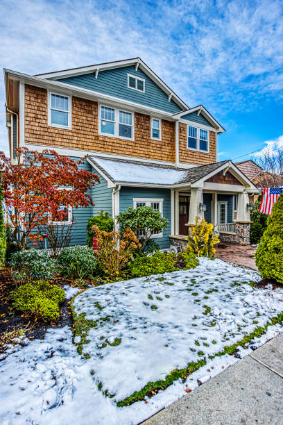istock Modern American Suburban Home Exterior in Winter 1455367314