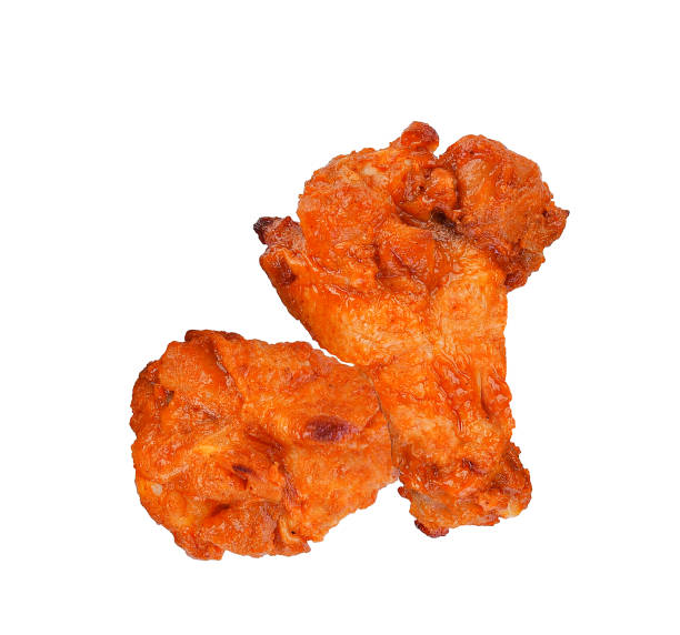 istock Barbecue chicken legs isolated on white 1455380460