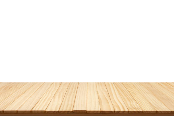 istock Empty wooden table top isolated on white background for product display montage 1455385739