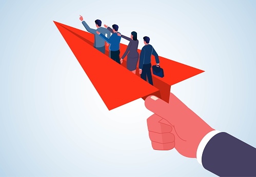 Helping or guiding employees or small businessmen to achieve success or goals, career coaching or business support, a group of businessmen standing on a paper airplane and a huge hand pushing it to take off