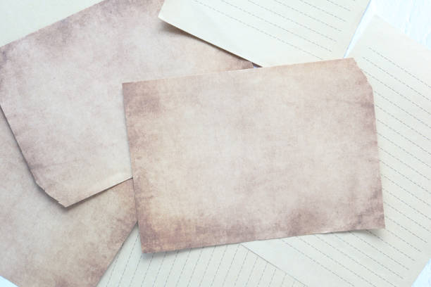 istock top view of Old Paper texture on black background 1455387877