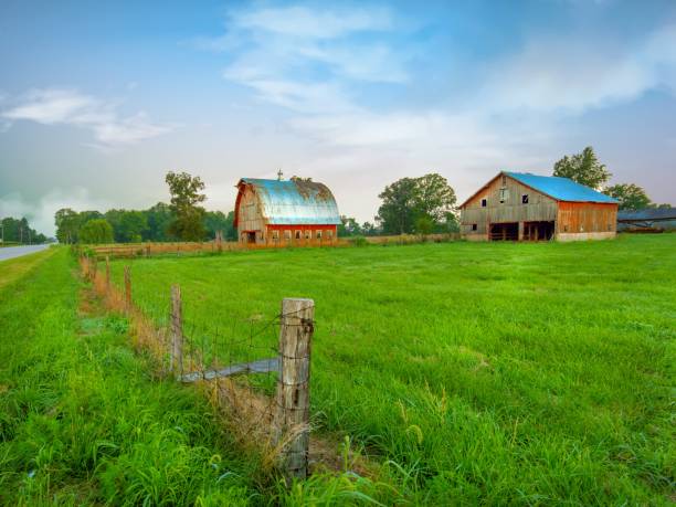 istock Old weathered barns with fence-Howard County, Indiana 1455388419