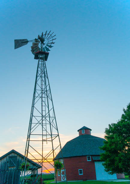 istock Windmill and Barn at sunset-Howard County, Indiana 1455389038