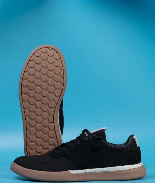 istock Modern trendy black pair sneakers shoes 1455390941