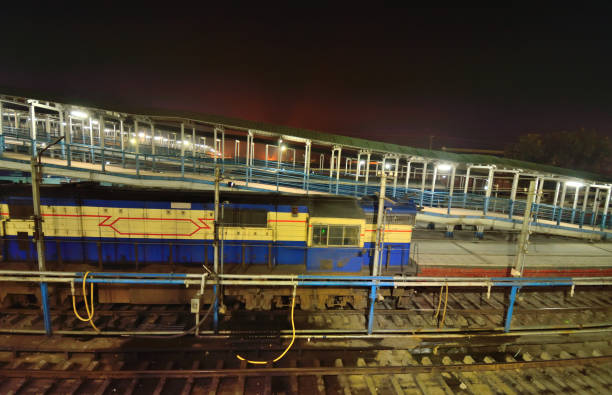 istock A train standing in the railway platform at night. 1455391536