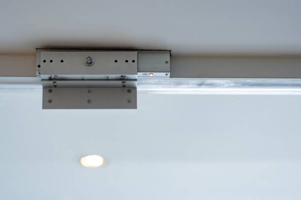 istock An electromagnetic lock, a maglock or electromagnet lock, is a type of locking device that uses an electromagnet to secure a door in place. It is often mounted on glass doors. 1455391928