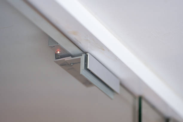 istock An electromagnetic lock, a maglock or electromagnet lock, is a type of locking device that uses an electromagnet to secure a door in place. It is often mounted on glass doors. 1455392813
