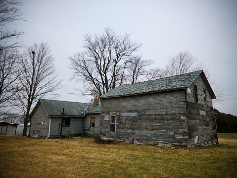An abandoned and decaying farmhouse from the 1800's
