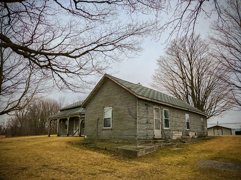 An abandoned and decaying farmhouse from the 1800's