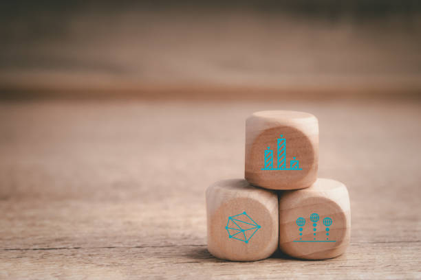 istock business strategy, Action plan, Goal and target, hand stack woods block step on table with icon about business strategy and Action plan. business development concept. 1455396318