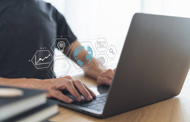 istock Businessperson using laptop for online working via internet. Digital business intelligence solution, communication and connection technology. Financial and banking data, marketing information analysis 1455402734