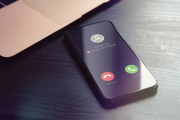 istock Scam fishing phone call from unknown number that was identified by a security anti-scam app as alert and fraudulent. Block Scam and Unwanted Calls concept 1455402918