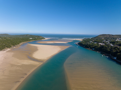 Aerial shot looking over the Kariega River in Kenton on Sea along the Eastern Cape Coastline of South Africa. Holiday destinations in the Eastern Cape