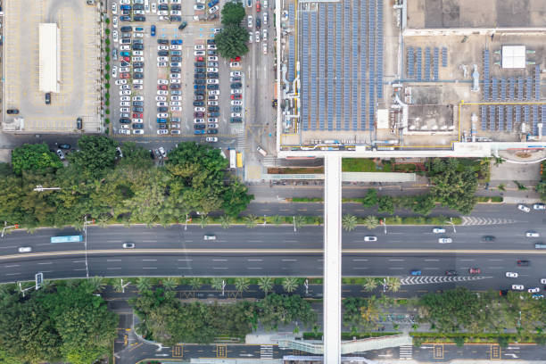 istock Rooftop solar panels and outdoor parking on urban rooftops 1455406825