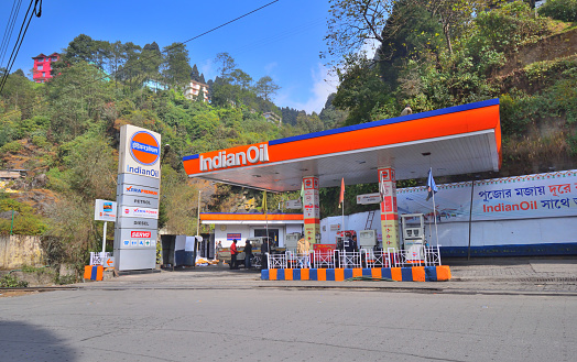 Ghum, India - November 17, 2018: An indian oil petrol pump by the side of the road.