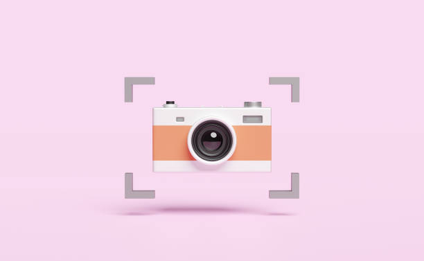 istock silver color camera isolated on pink pastel background,3d illustration or 3d render 1455408862