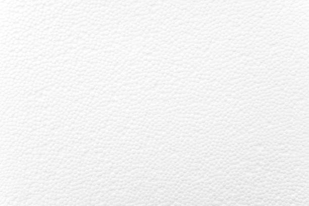 White foam plastic or styrofoam as texture or background, top view, space for text stock photo